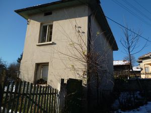 Old country house with plot of land located in small village