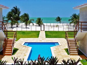 Tropical island beachfront 2 bed home, turnkey, for sale