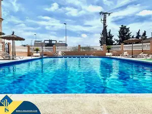 Second-floor bungalow with communal swimming pool