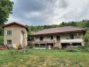 Partially renovated property with land and quiet location