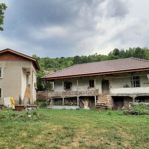 Partially renovated property with land and quiet location