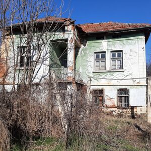 Old rural house with barn, land and mill in a quiet village