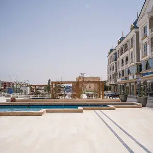 68m apartment with double view  the main street and garden