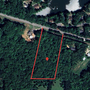 7.34 Acre Homesite with 470 ft Paved Frontage & Utilities