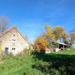 Characterful French cottage with outbuildings and garden.